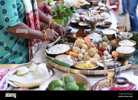 Assamese Women Displays Assamese Traditional Food Items Ahead Of Bhogali Bihu In A Bhogali Mela