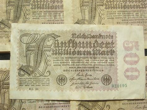 An Old German Bank Note Sitting On Top Of Another One