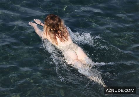 Clara McGregor Sexy Shows Off Her Hot Figure In A Swimsuit Out In Ischia AZNude