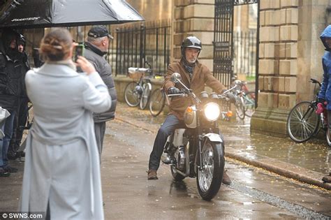 Pierce Brosnan Is No 007 As He Struggles To Ride His Classic Motorbike