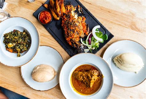 Nigerian Food: Delicious Pounded Yam, Eba, Banga Soup and Efo Riro with ...