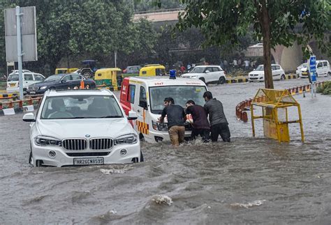 Heavy Rain Lashes Delhi Ncr Waterlogging In Several Areas In Pics