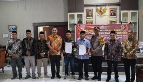 GoSumut Plt Bupati Dan KPU Palas Tanda Tangani NPHD Pilkada 2024