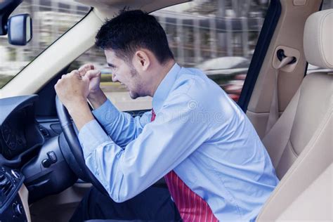 Portrait Of Angry Businessman Driving A Car Stock Photo Image Of