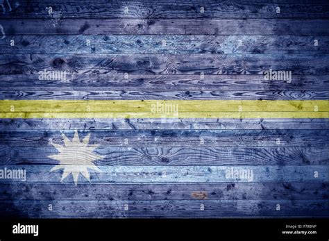 A Vignetted Background Image Of The Flag Of Nauru Painted Onto Wooden