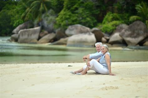 Premium Photo Portrait Of Elderly Couple Rest At Tropical Beach