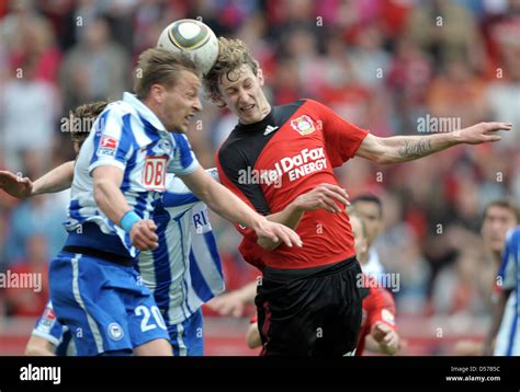 Leverkusen S Stefan Kiessling And Berlin S Goalkeeper Patrick Ebert L