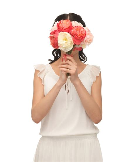 Premium Photo Young Woman Holding Bouquet Of Flowers Over Her Face