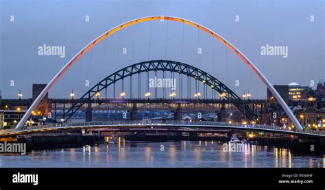 The Gateshead Millennium Bridge And The Tyne Bridge Newcastle Upon