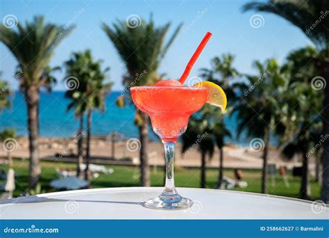 Colourful Cold Strawberry Daiquiri Cocktail Drink Served In Glass At