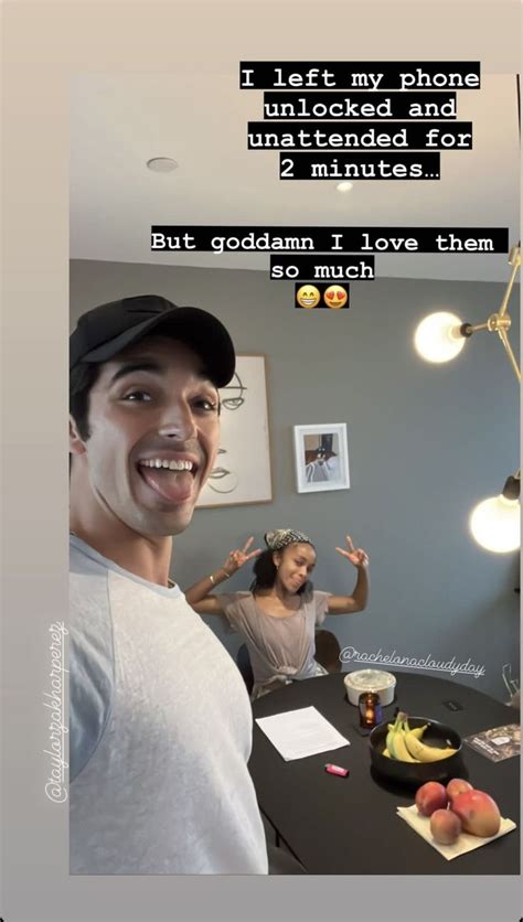 Two People Standing In Front Of A Table With Food On It And One Person