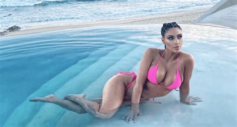 Kim Kardashian Flaunts String Bikini In Sports Illustrated Swimsuit 2022