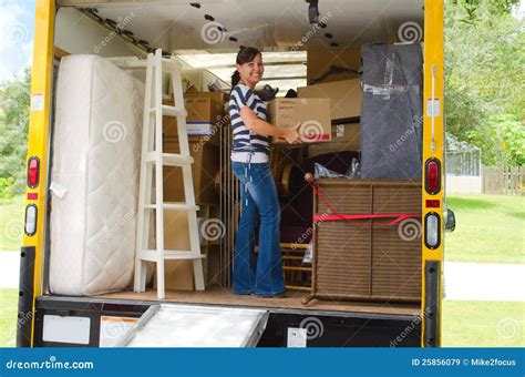 Pretty Woman Loading A Full Moving Truck Stock Image Image Of Rental