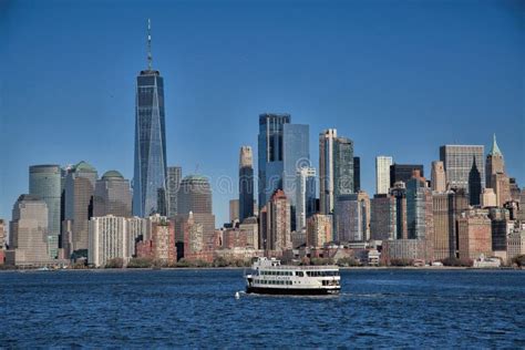 Manhattan Skyline and a Cruise Boat in New York Harbor Editorial Image - Image of boat ...