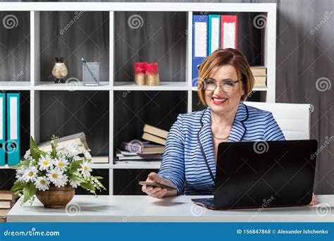 Senior Businesswoman Working In Office Stock Photo Image Of Older