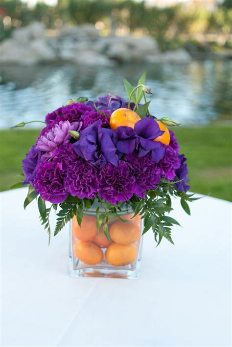 Lily Carnation And Clementine Centerpiece