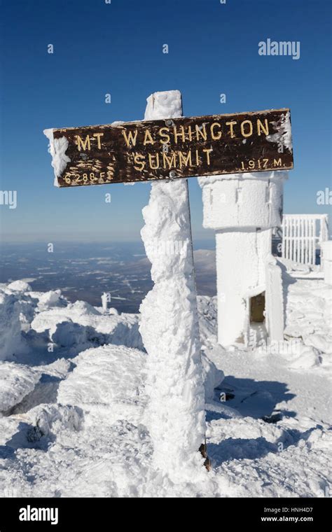 Summit sign on the summit of Mount Washington in the White Mountains ...