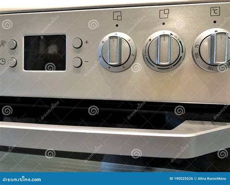 Oven Knobs on Metallic Structure Black and White Stock Photo - Image of ...