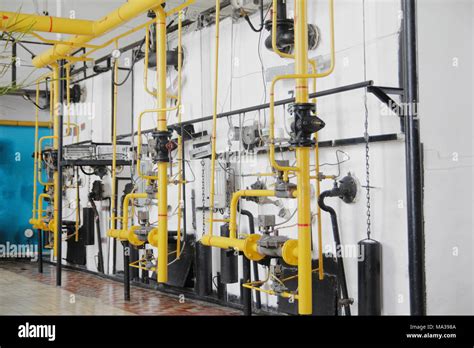 Manufacturing Site Yellow Tubes And Pressure Gauges Stock Photo Alamy