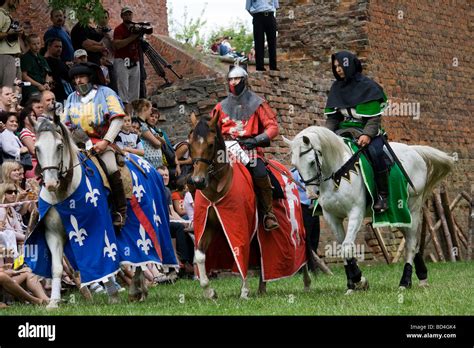 Medieval Cavalry Knights On Military Horses Presenting Themselves To