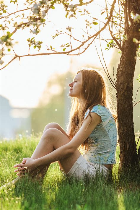 Woman Sit Apple Tree Spring Flowers Nature By Stocksy Contributor