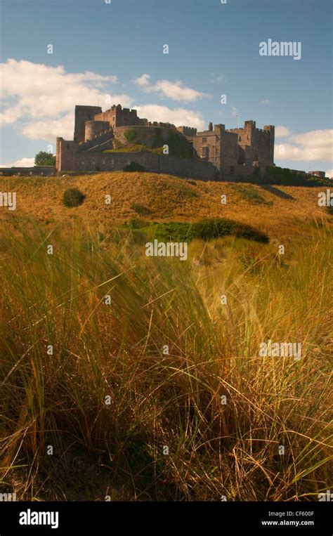 Bamburgh Castle From The Sand Dunes Stock Photo Alamy