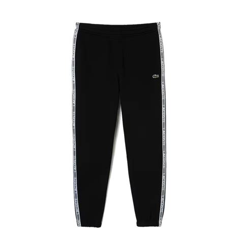 Pantalon de jogging Lacoste noir avec bandes siglées chez DM Sports