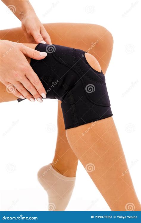 Knee Injury Girl Holds Hands Bandage On His Leg Stock Image Image