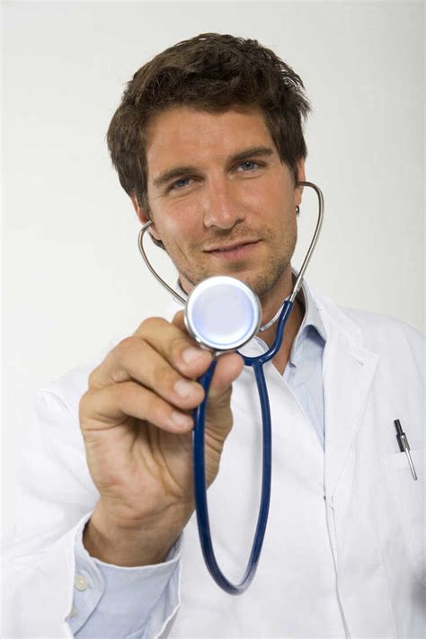 Male Doctor Holding Stethoscope Close Up Portrait Stock Photo