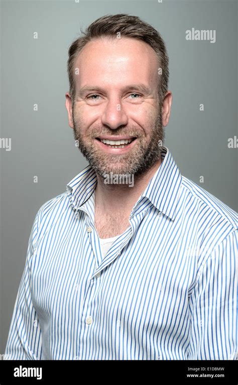 Portrait Of A Smiling Happy Handsome Man Stock Photo Alamy