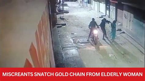 2 Two Bike Borne Miscreants Push Elderly Woman Snatch Gold Chain In