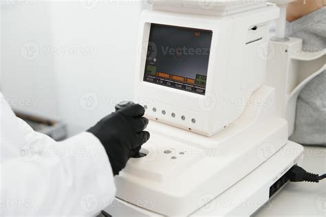 Modern Medical Equipment Close Up Of Ophthalmologist Using Auto