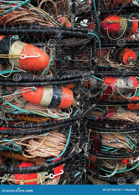 Red Fishing Buoys And Ropes In A Stack Of Crab Traps Stock Image