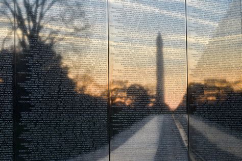 Wall of Faces: Photo found for each service member with name inscribed ...