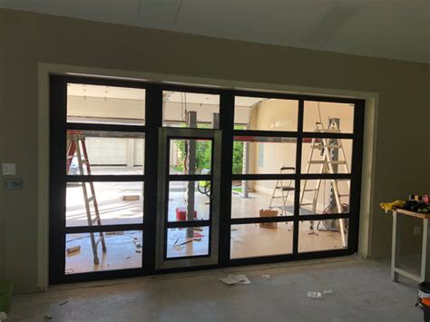 Contemporary Aluminum And Clear Tempered Glass Garage Door With Passage