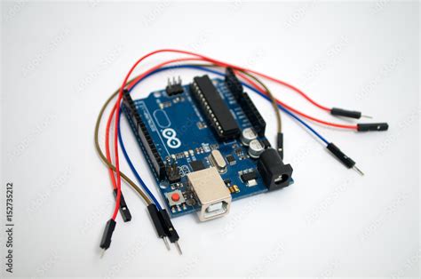 Arduino and around listed wire on a white background Stock Photo ...