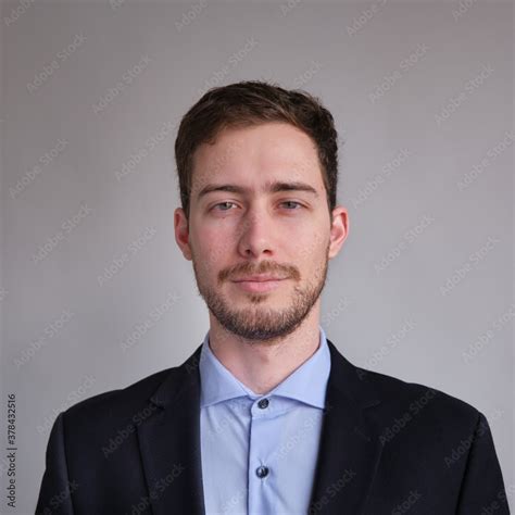 Passport Photo Of Cute And Well Dressed Caucasian Man In Jacket Shirt Or Suit And Tie Stock