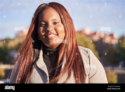 Portrait Of Happy Young African American Woman With Smiling Expression