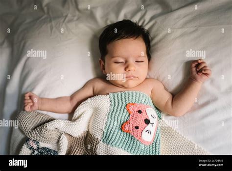 Cute Baby Sleeping On Bed Stock Photo Alamy