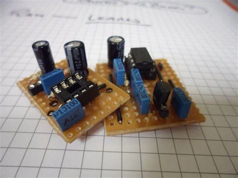 Three Electronic Components Sitting On Top Of Each Other