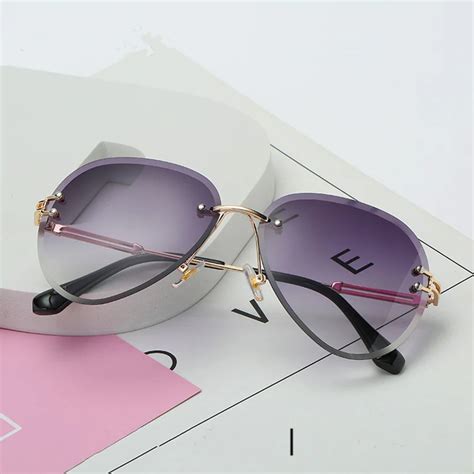 Xojox Luxury Rimless Sunglasses Women Design Brand Sun Glasses Metal