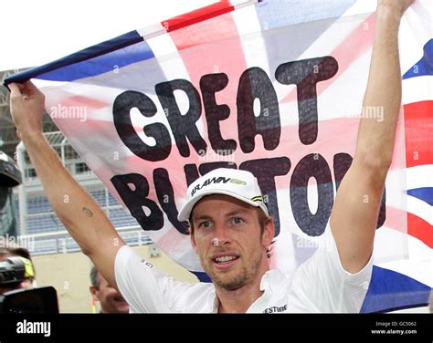 Brawn Gp S Jenson Button Celebrates After Winning The World