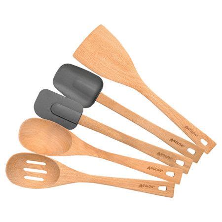 Wooden Spoons And Spatulas Lined Up In A Row