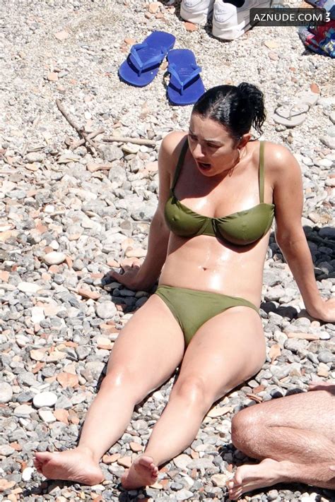 Charli XCX Sizzles In The Italian Sun In Her Sexy Skimpy Green Bikini AZNude