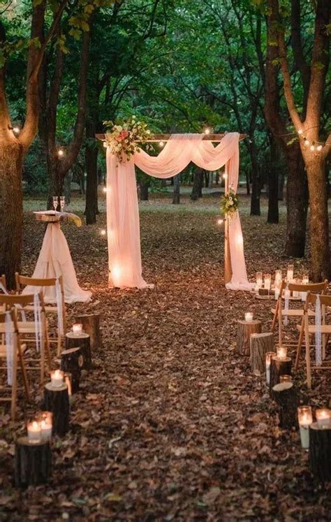 An Outdoor Wedding Set Up In The Woods