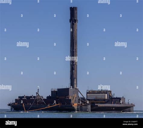 Very Sooty Fleet Leading SpaceX Falcon 9 Booster B 1067 Arrives On JRTI