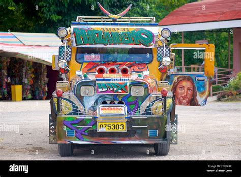 Filipino Jeepney Decorated With Painted Image Of Jesus Christ Cebu