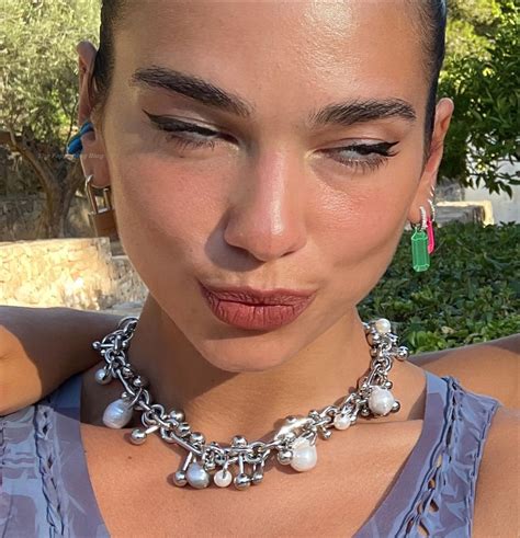 Dua Lipa Braless 7 Photos Thefappening