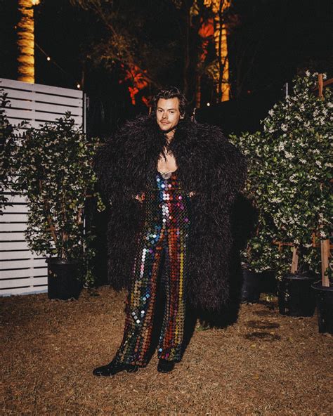 Harry Styles Wears Plunging Gucci Jumpsuit At Coachella Popsugar Fashion