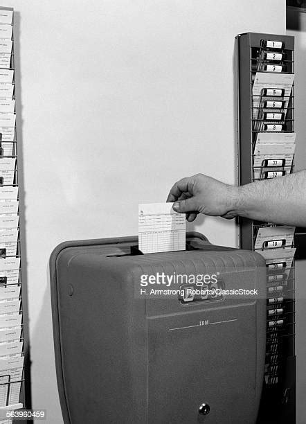 Punching Time Card Fotografías E Imágenes De Stock Getty Images